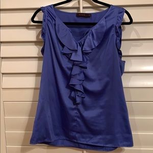 Beautiful blouse and very comfortable size Large.